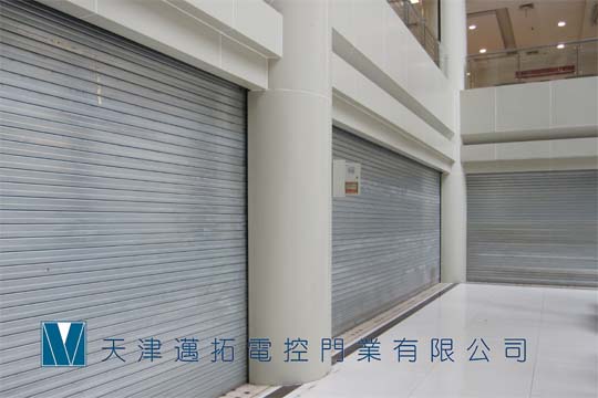 天津感應門天津優質玻璃旋轉門，優質不銹鋼旋轉門電話：13820028956工業快速門、滑升門