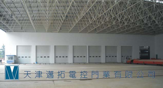 天津快速卷簾門邁拓電控供應天津武清工業滑升門，供應提升門，供應翻板門工業提升門
